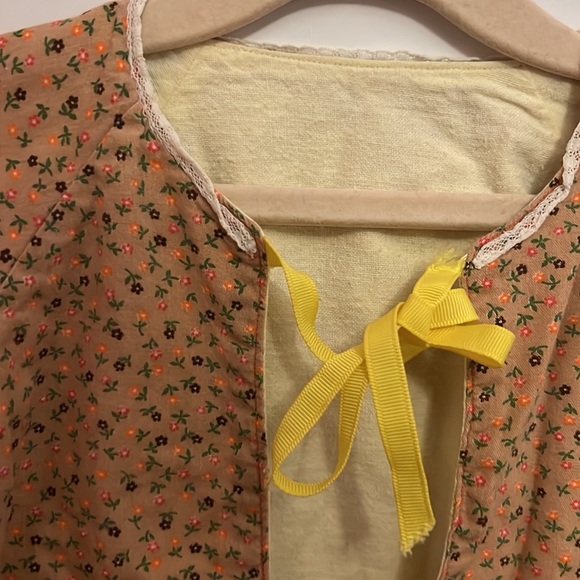 Lace neck detail small floral print two toned tie bows in back. - Picture 3 of 3